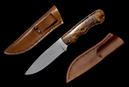 Jagdmesser “Wolverine“ <br /> Klinge: N670-Stahl, 10,5 cm <br /> Griffschalen: Wüsten-Eisenholz <br /> Gesamtlänge: 21 cm