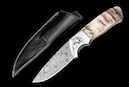 Messer “Hunter Special“<br />Rams Horn, Klasse 1 <br /> Klinge: Damast-Stahl, 7,6 cm<br /> Gesamtlänge: 17,2 cm<br />CHF 630,-