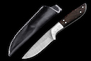 Messer “Ibex“<br />Maccas Ebony, Klasse 1<br /> Klinge: Damast-Stahl, 8,3 cm<br /> Gesamtlänge: 19,2 cm<br />CHF 480,-